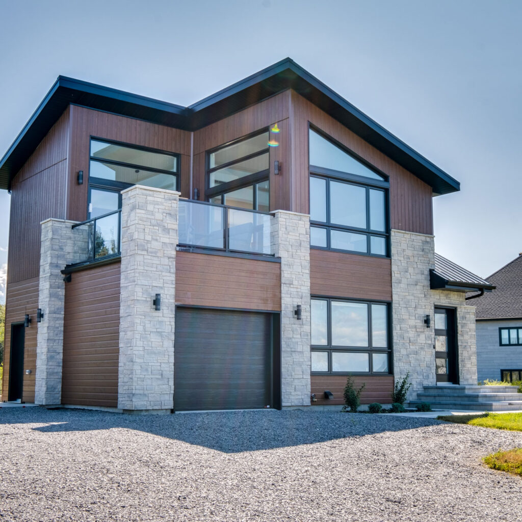 Batitech maison usinee garage loft facade / Prefabricated home with a garage and loft